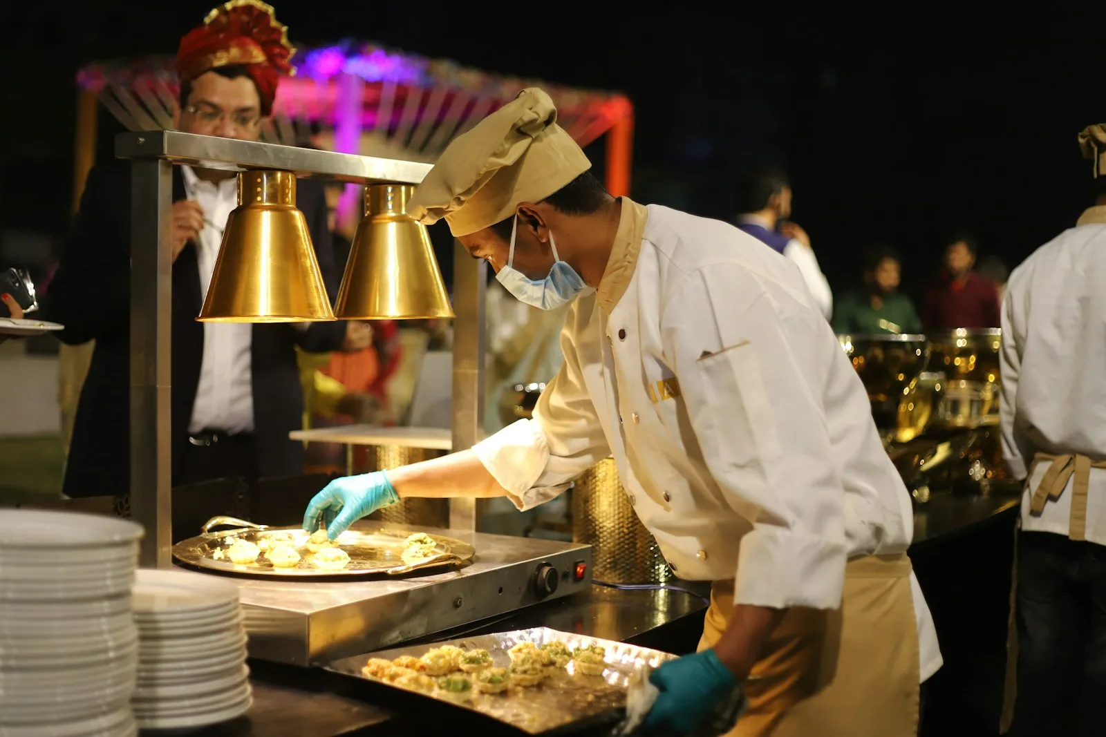 Koch bei der Live Cooking Station auf einem Firmenevent